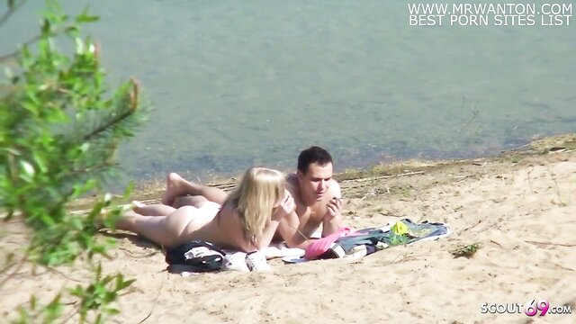 real teen couple on german beach