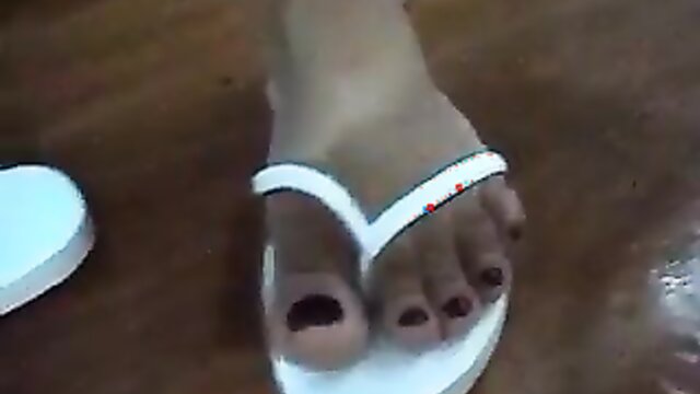 white feet in sandals
